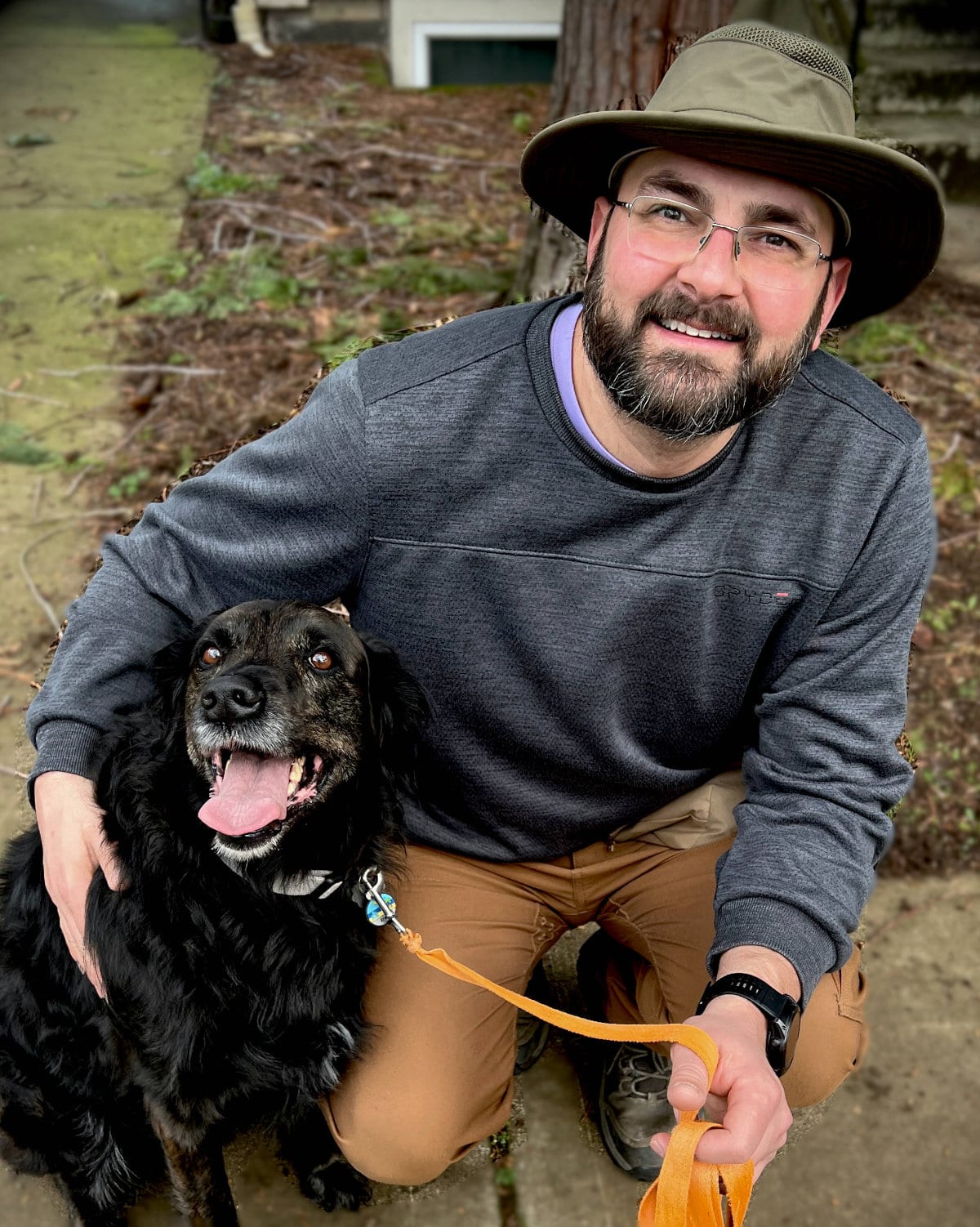 Jake, founder of TechButler PDX, with his dog